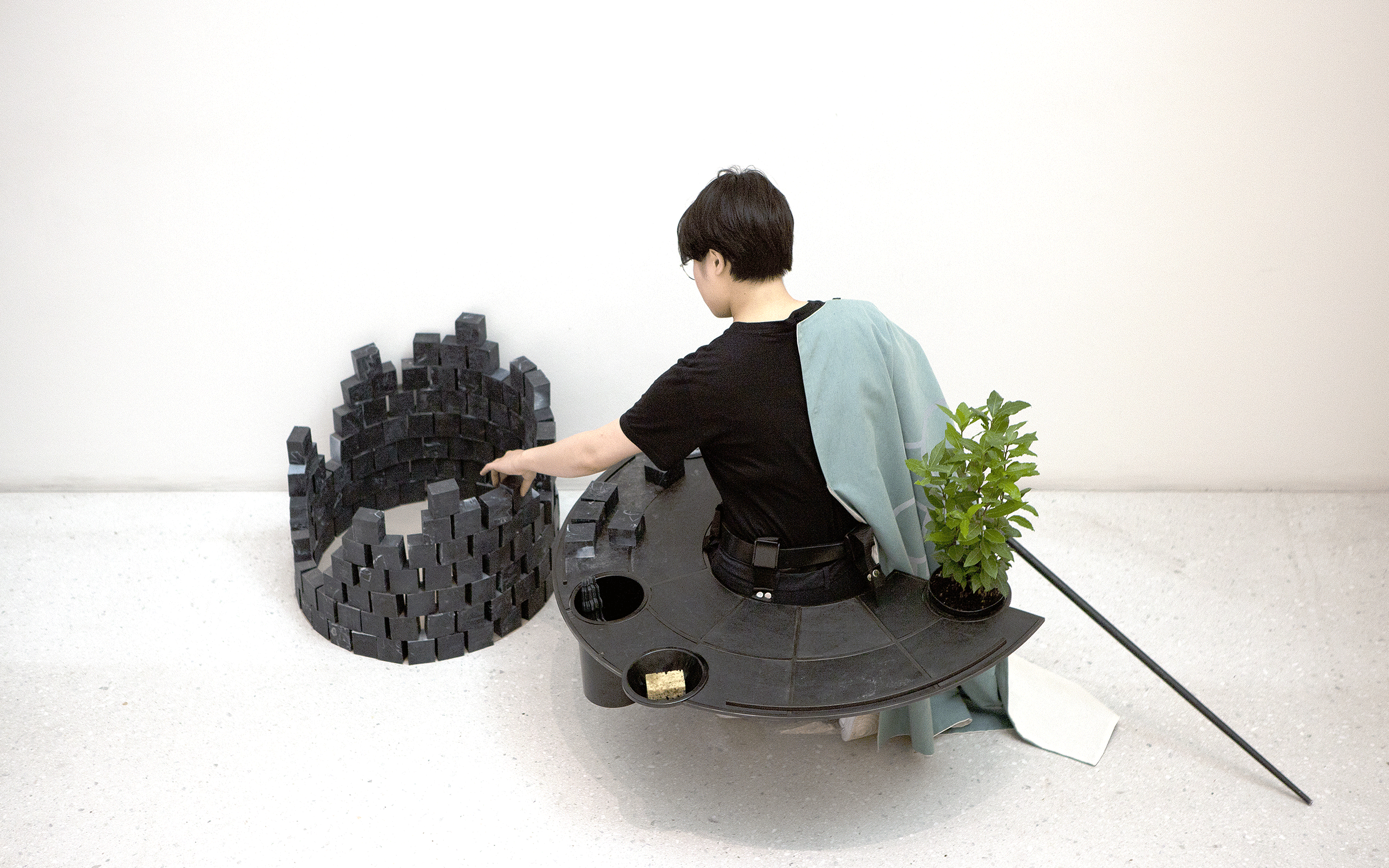 Installation view of Otobong Nkanga, The Carrier (Ji Yun Lee) , Carved to Flow, Kassel, Germany, 2017. Photograph by Lena Heubusch. Courtesy of the artist. 